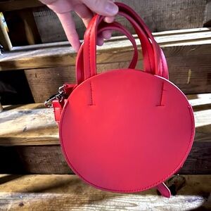 NWOT Urban outfitters red round faux leather crossbody bag